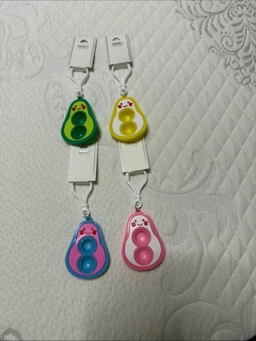 Set of 12 Mint Avocado Pop Keychain Trio in Green, Yellow, Blue & Pink
